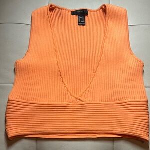 Cute orange crop top. Good condition size medium.